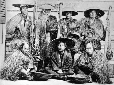 Japanese Coolies in Straw Raincoats, c.1860s by Japanese Photographer